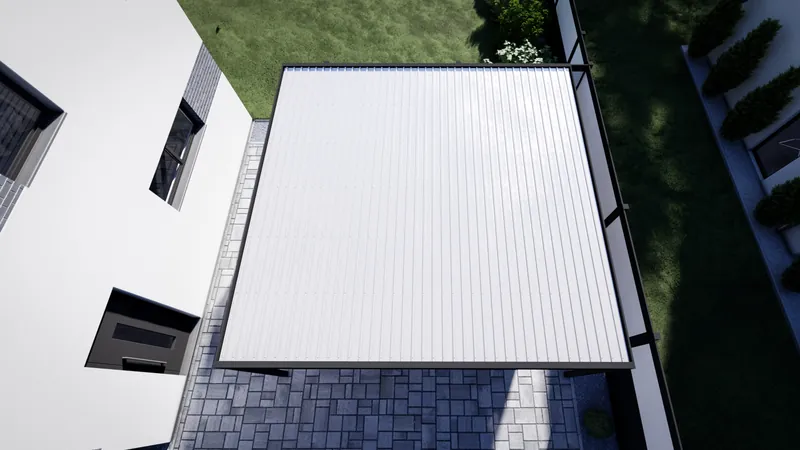 Flachdach-Carport mit silberfarbenem Trapezblech von oben, neben einem Wohnhaus
